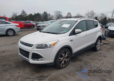 2016 Ford Escape Titanium z USA, uszkodzony, nr VIN 1FMCU9J92GUB31741